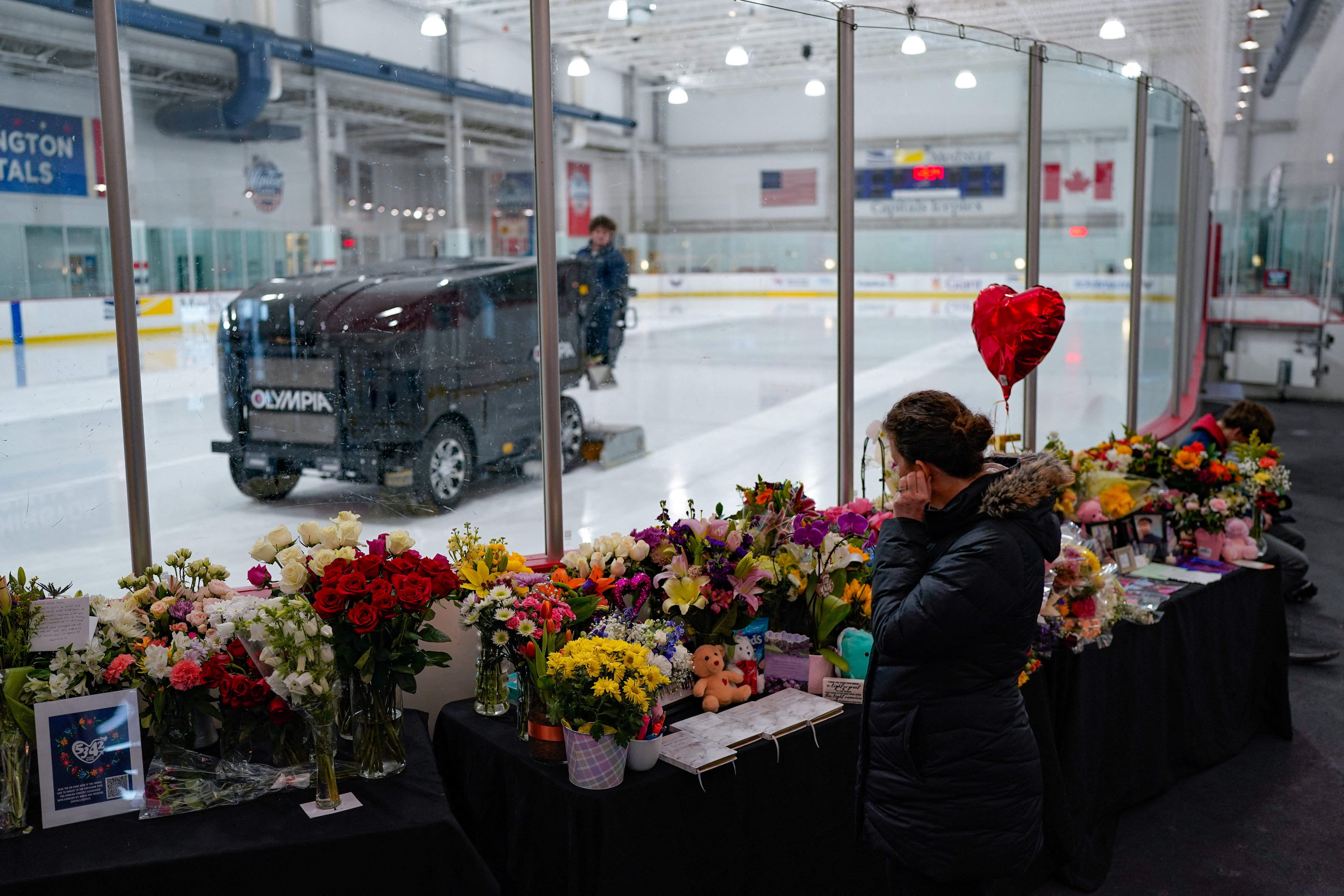 A memorial honoring figure skaters who were among the passengers killed in the collision at Regan National Airport