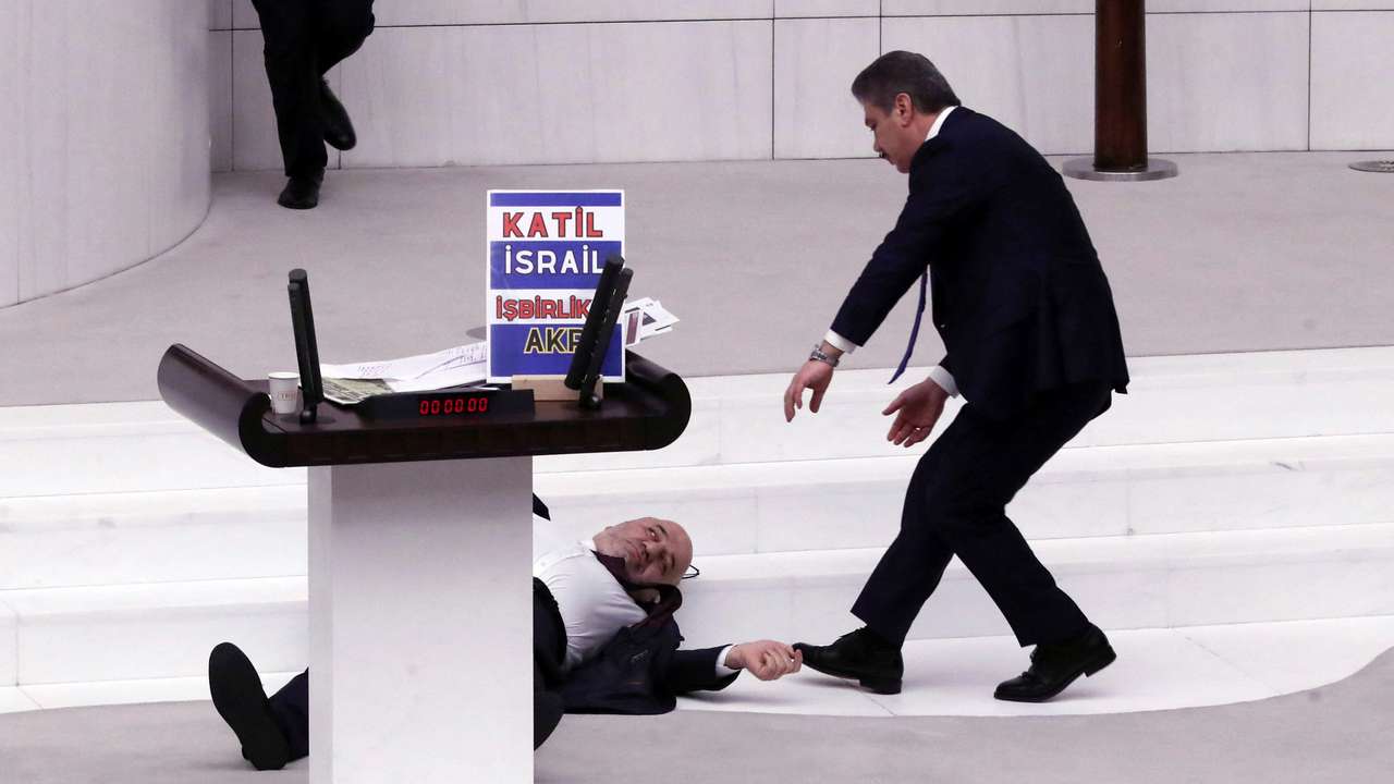 Turkey's Saadet lawmaker Hasan Bitmez collapses at the parliament in Ankara