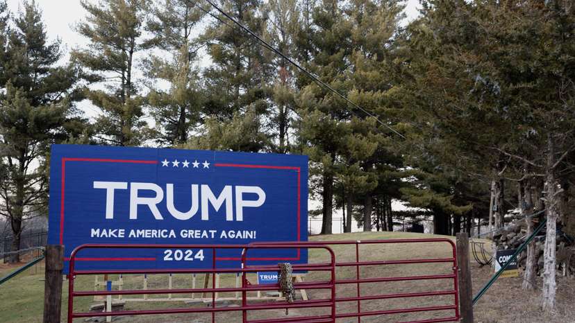 Political signs are on display ahead of the Iowa Republican Caucus, in Des Moines, Iowa