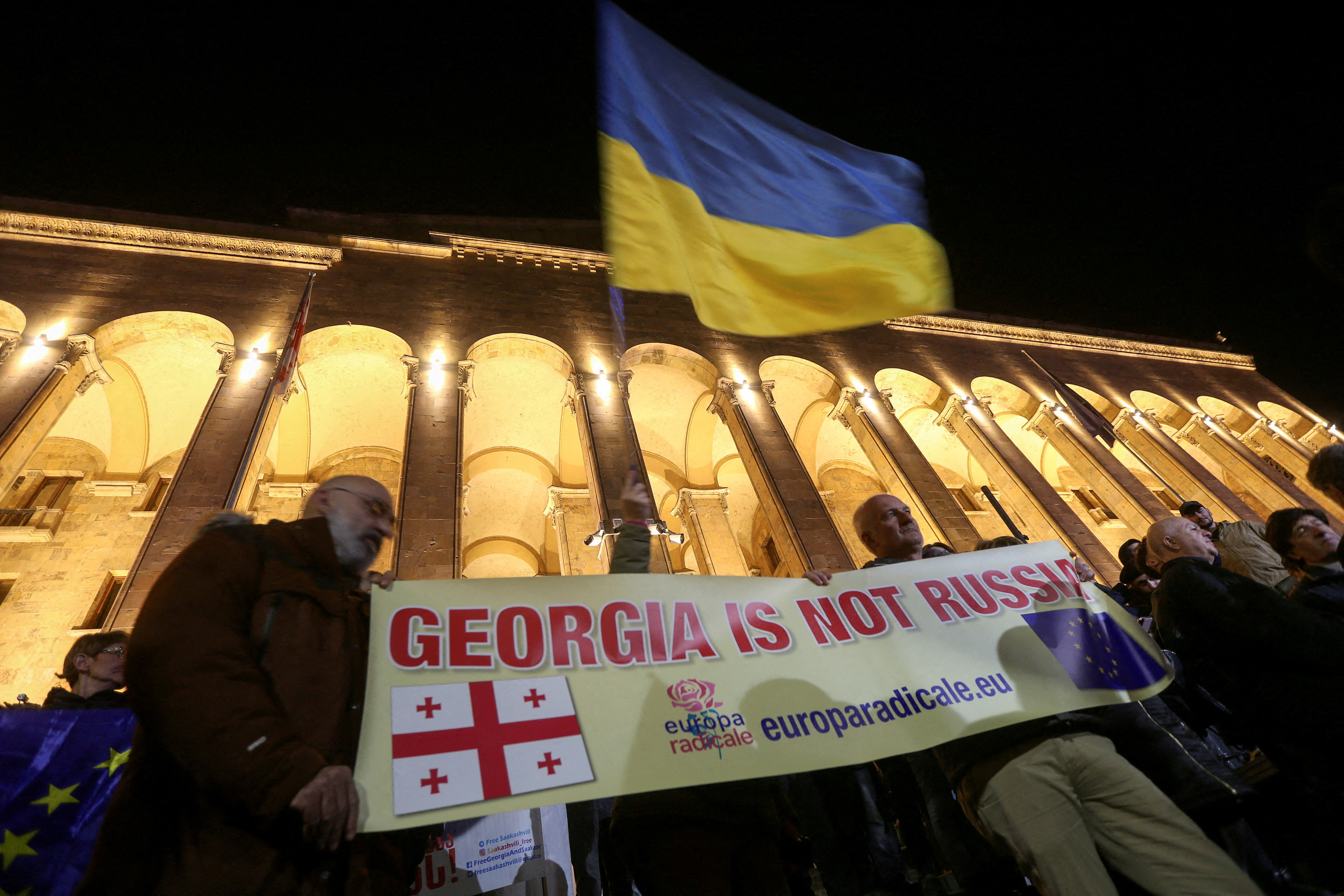 FILE PHOTO: Protesters gather outside Georgian parliament after disputed election