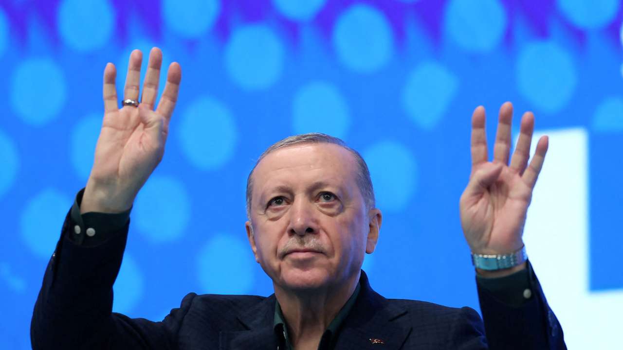 Turkish President Erdogan greets members of his ruling AK Party in Ankara