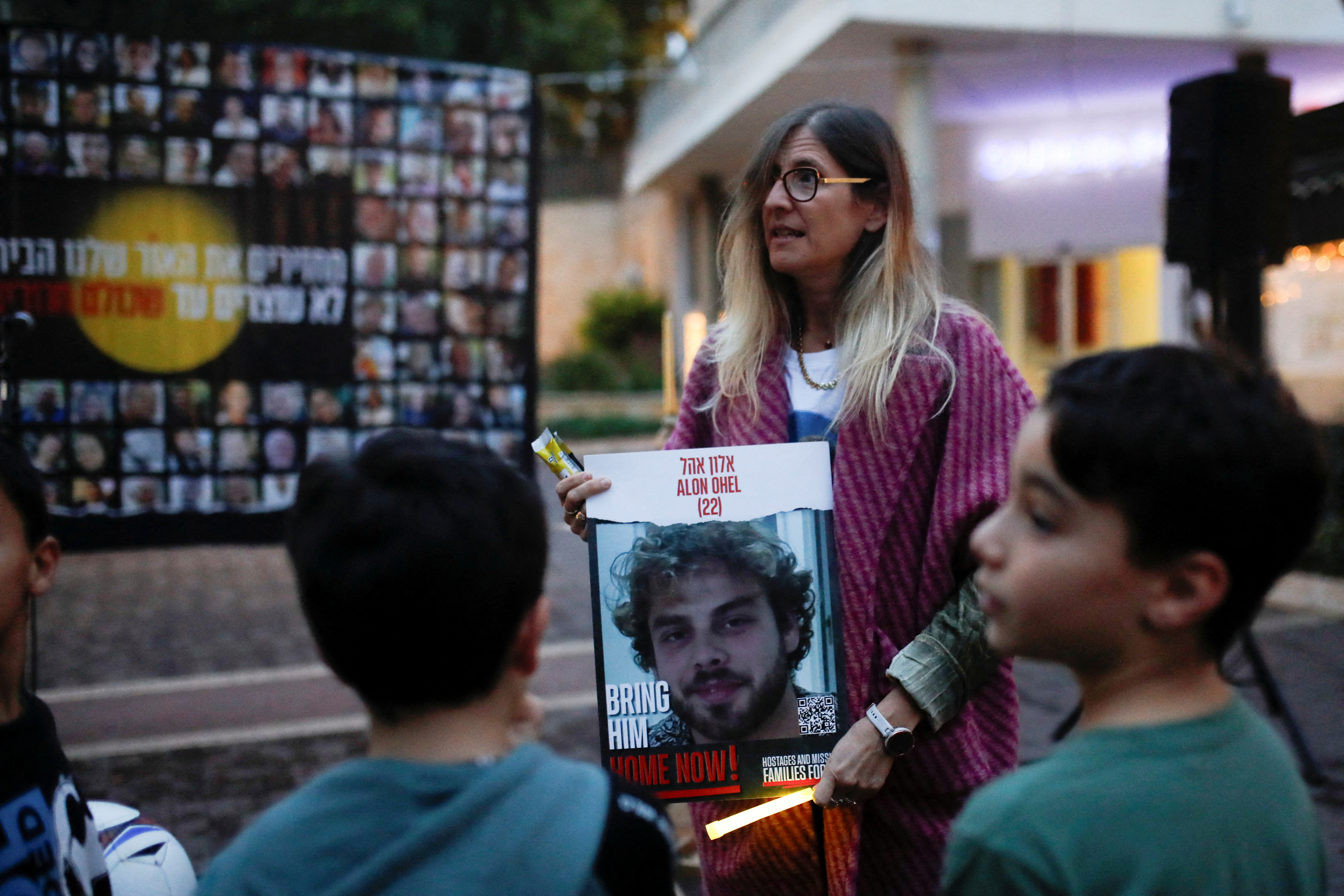 FILE PHOTO: Family members of hostages gather to light candles to mark the first night of the Jewish holiday of Hanukkah, in Karmiel