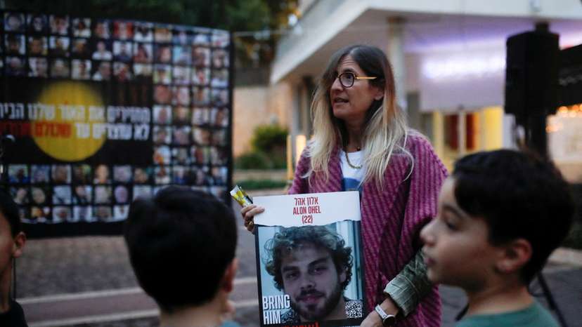 FILE PHOTO: Family members of hostages gather to light candles to mark the first night of the Jewish holiday of Hanukkah, in Karmiel