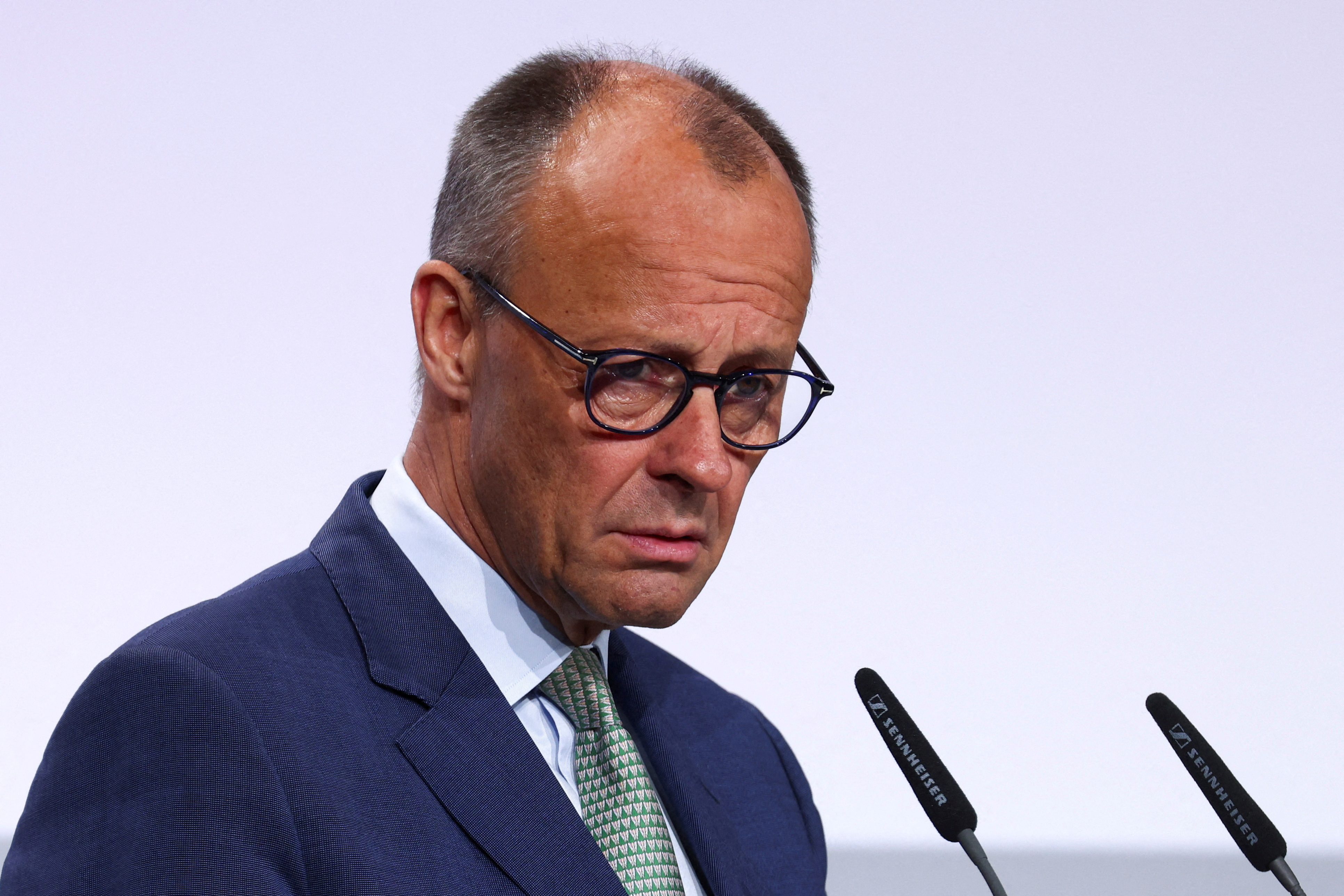 German Chancellor Merz delivers a speech at the German Association of Towns and Municipalities event in Berlin