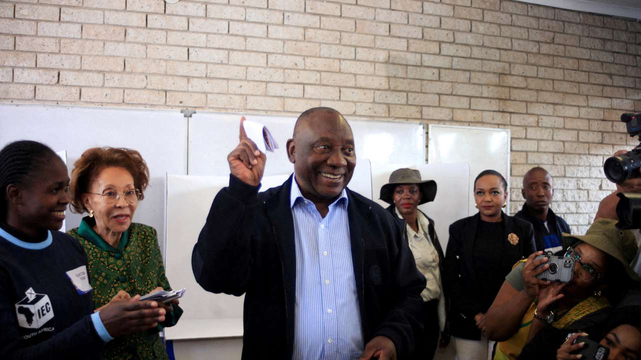 FILE PHOTO: South African president Cyril Ramaphosa votes in Soweto