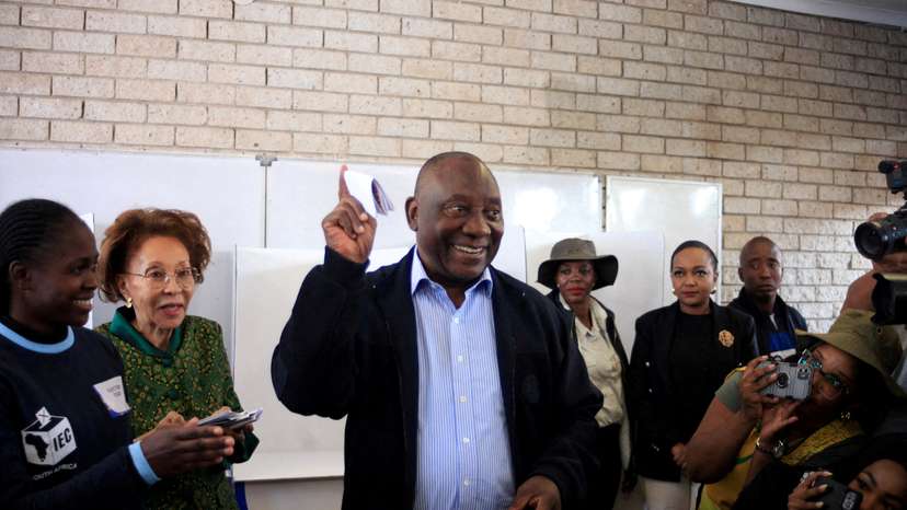 FILE PHOTO: South African president Cyril Ramaphosa votes in Soweto