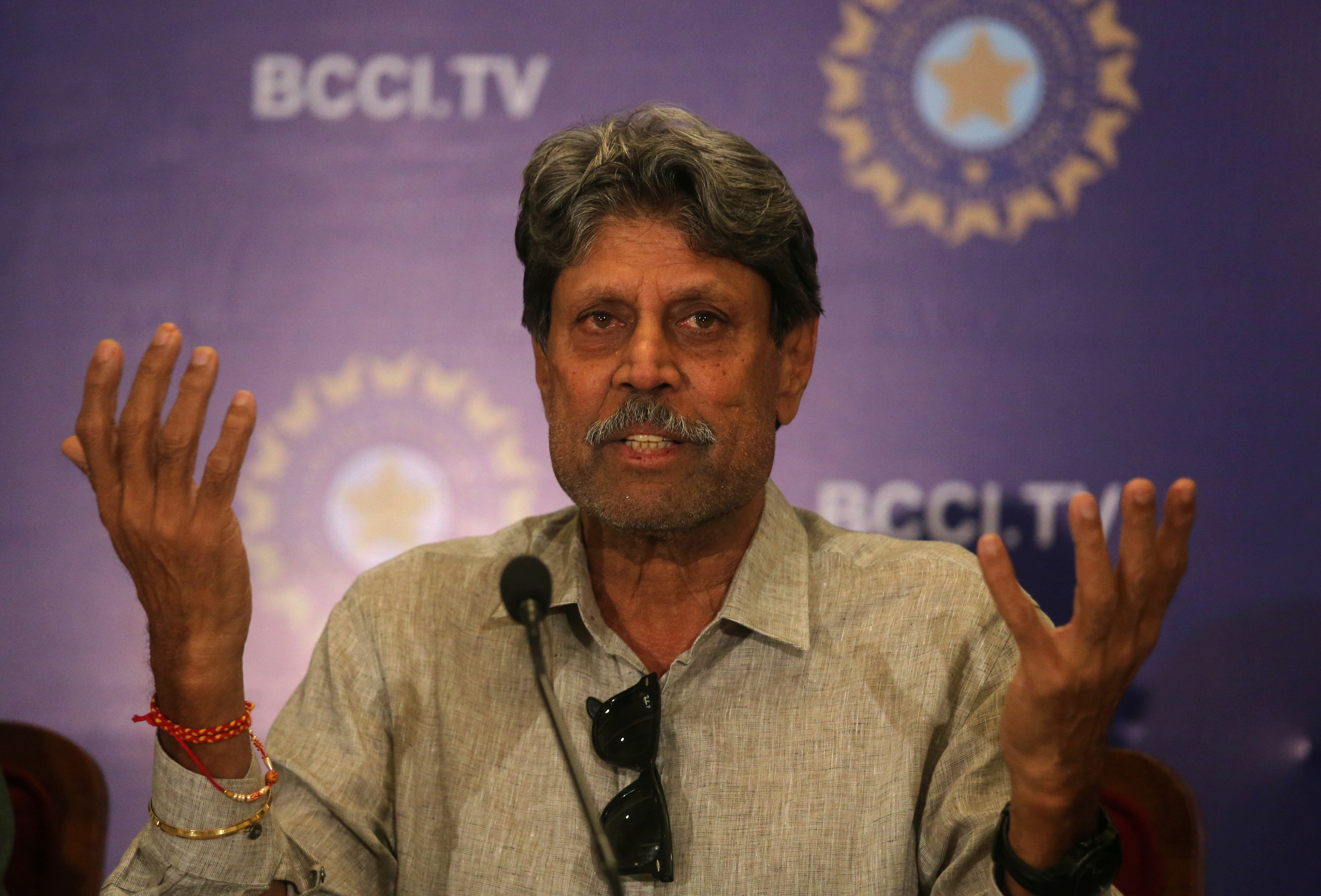 Kapil Dev speaks during a news conference in Mumbai