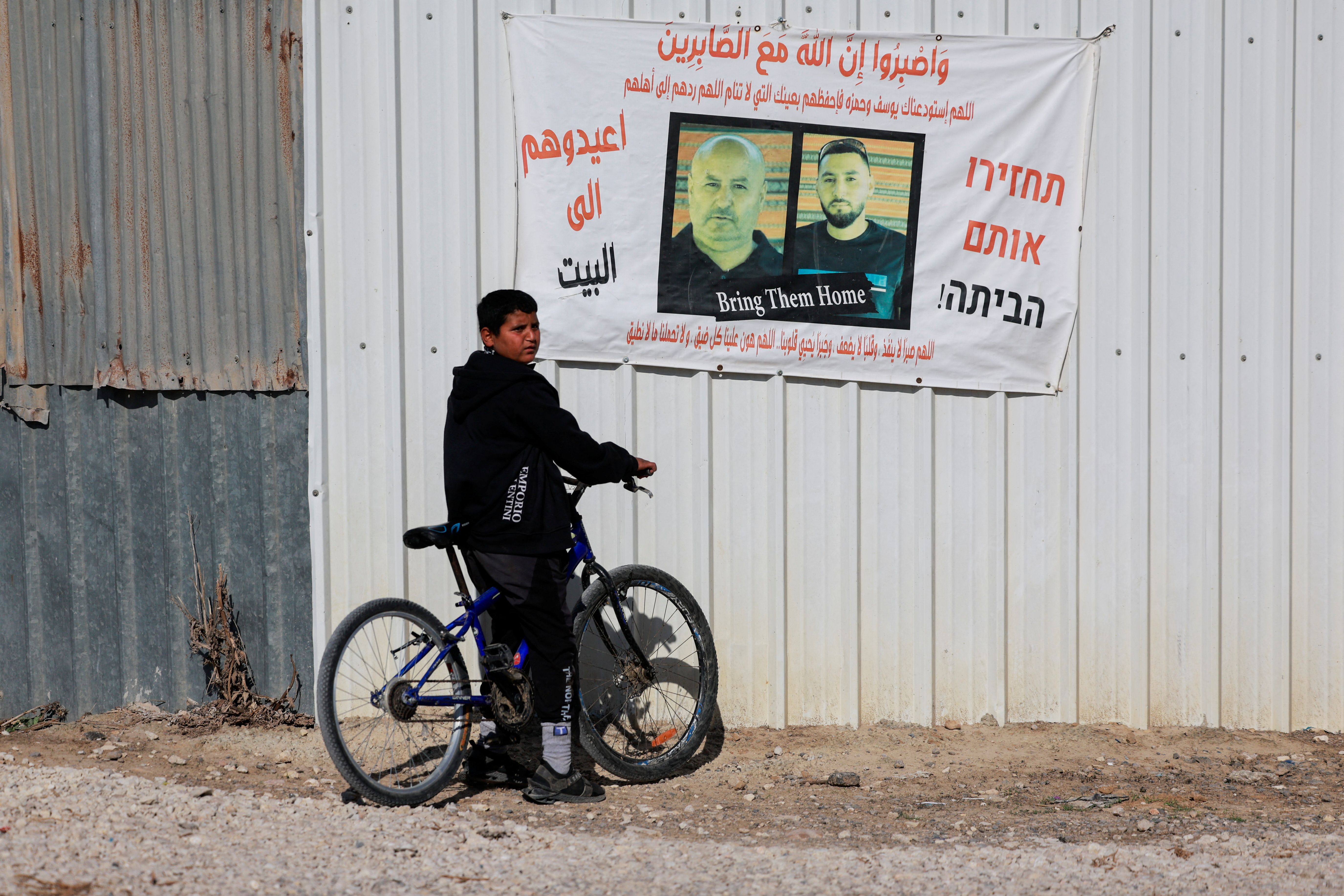 Friends and family gather at the family home of Bedouin Israeli hostages seized during the deadly October 7 attack by Hamas, in Rahat