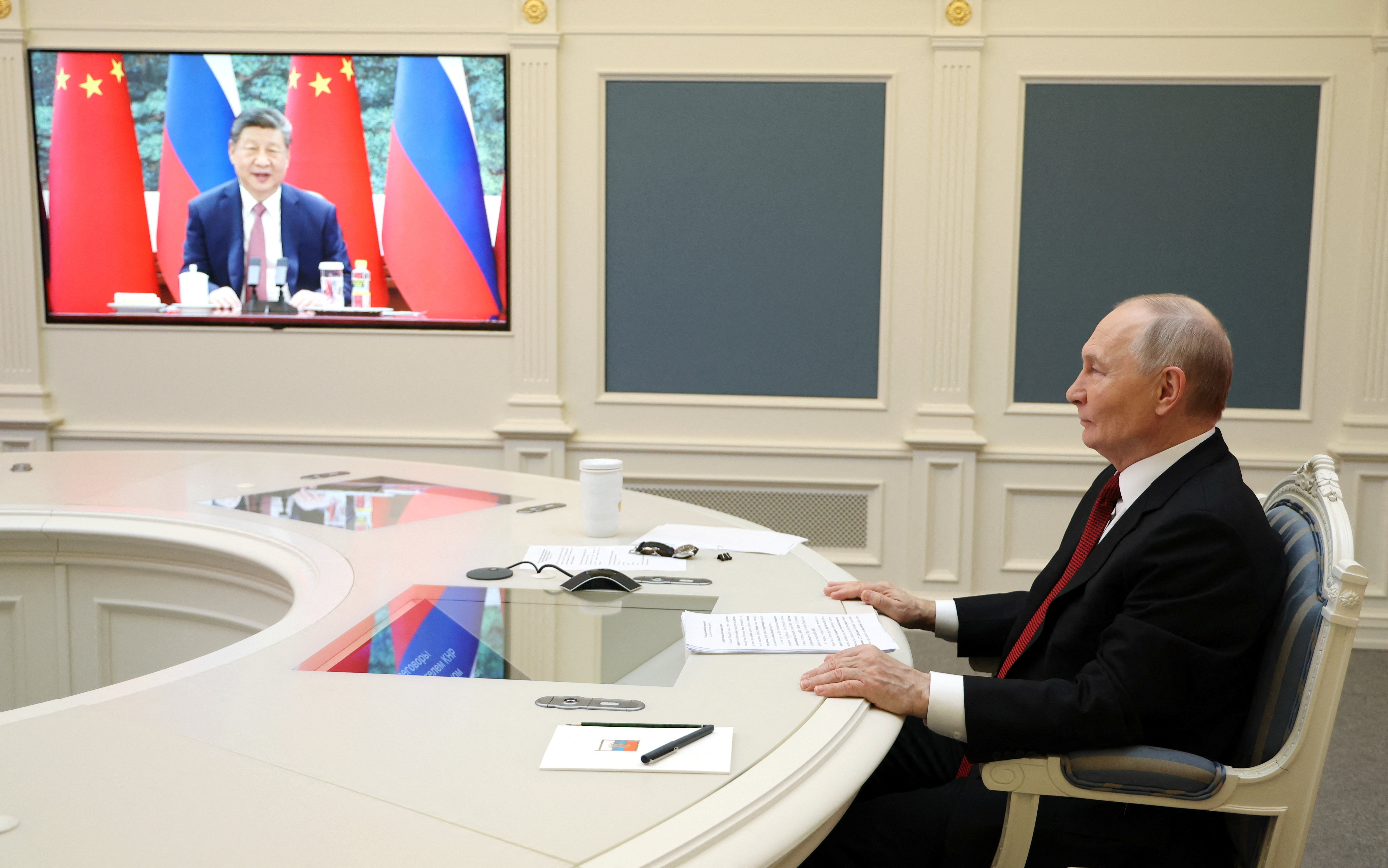 Russia's President Putin holds talks via video link with China's President Xi