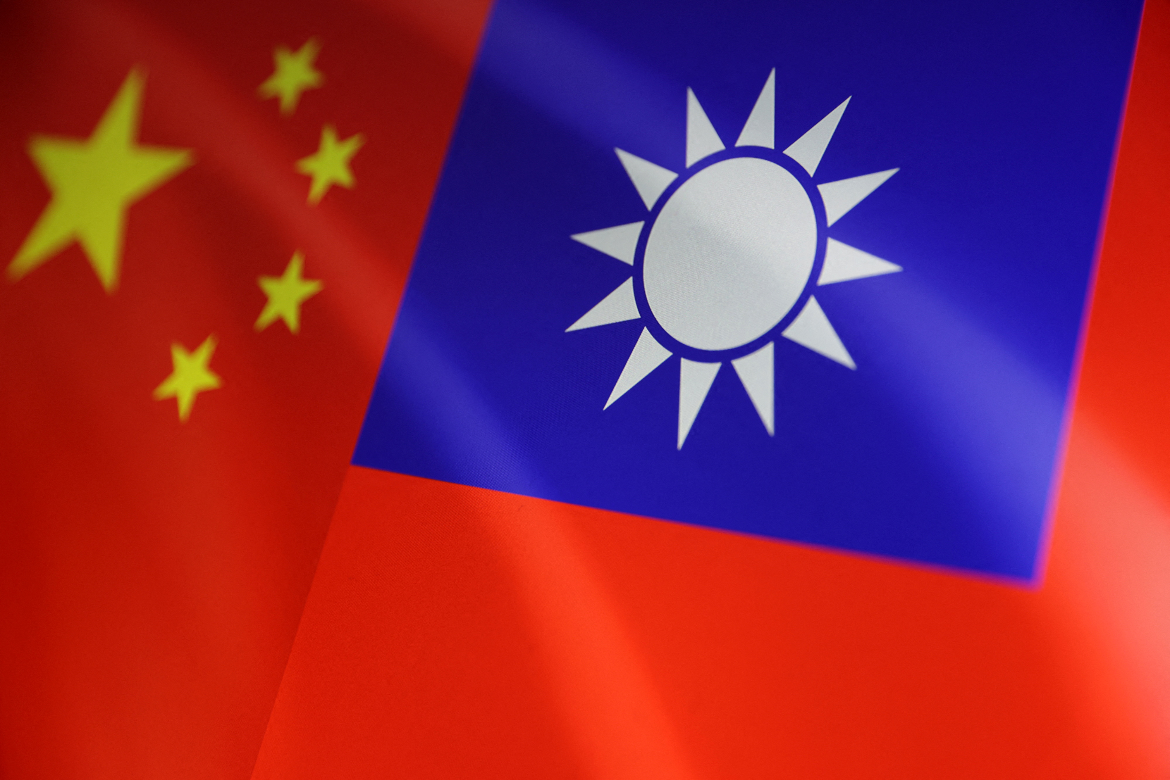 FILE PHOTO: Chinese and Taiwanese flags are seen in this illustration