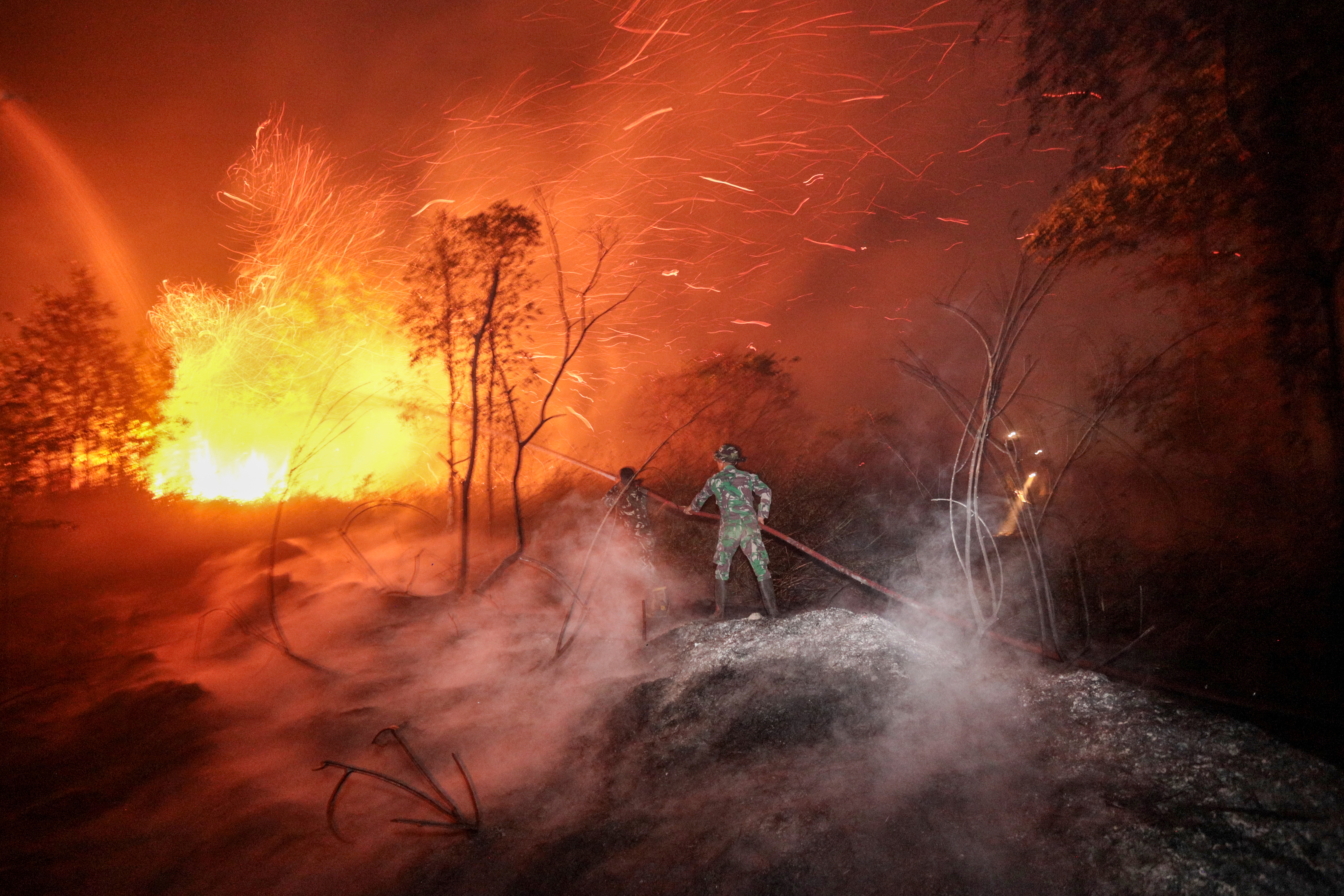 AFP__20261013__D34M4V9__v4__HighRes__TopshotIndonesiaPollutionEnvironmentFire