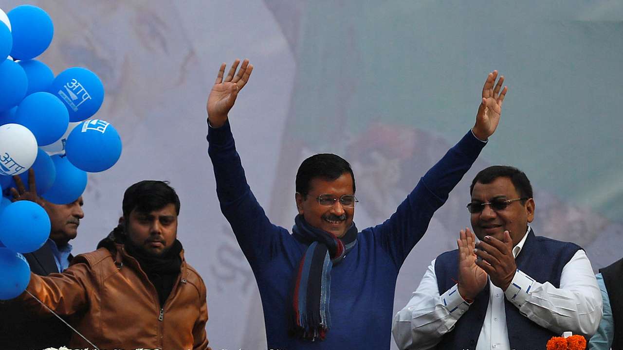 FILE PHOTO: Delhi Chief Minister and leader of Aam Aadmi Party Arvind Kejriwal waves to his supporters during celebrations at the party headquarters in New Delhi