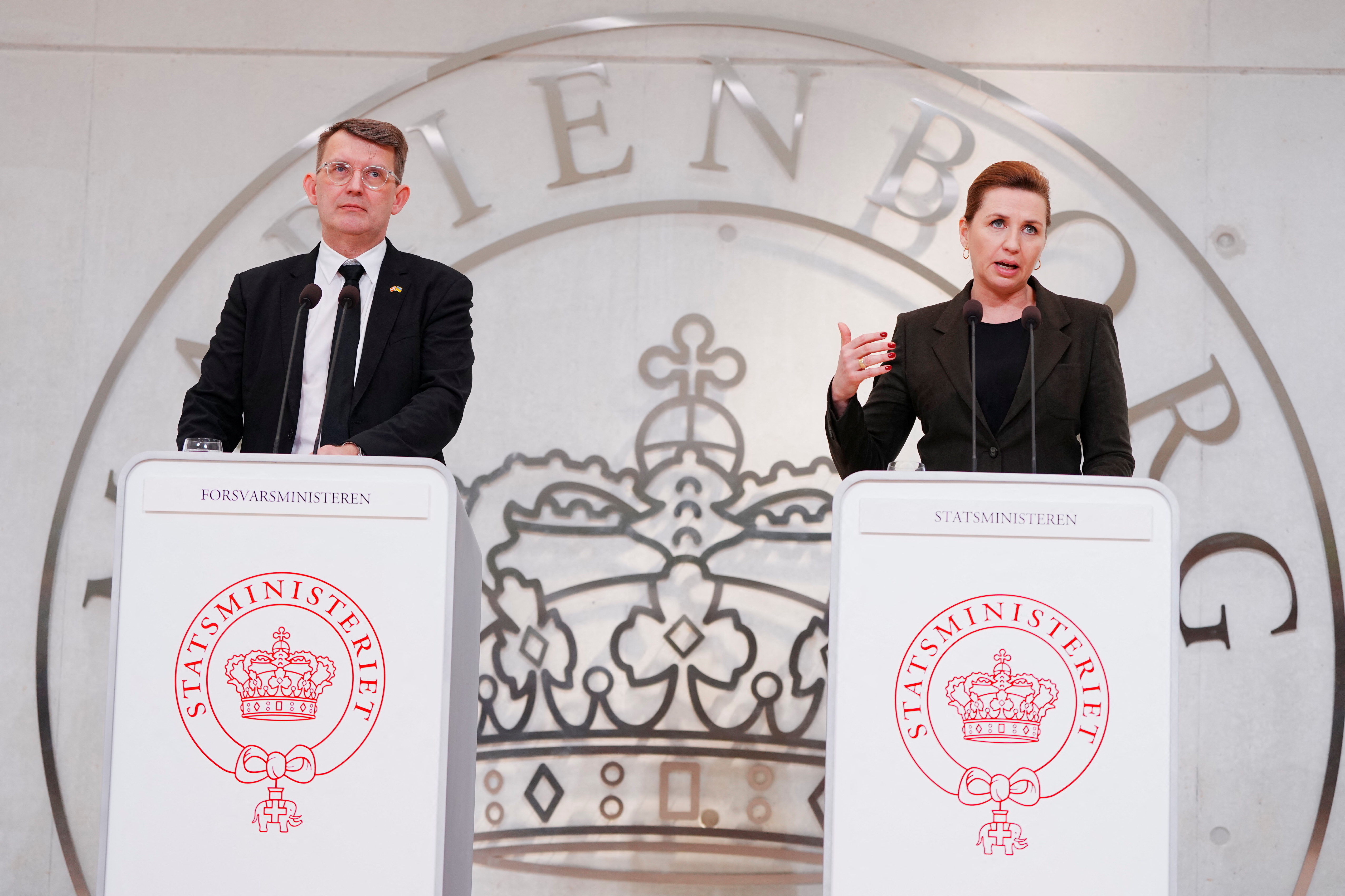 Danish Prime Minister Mette Frederiksen and Deputy Prime Minister and Minister of Defence Troels Lund Poulsen speak during a press conference in Copenhagn