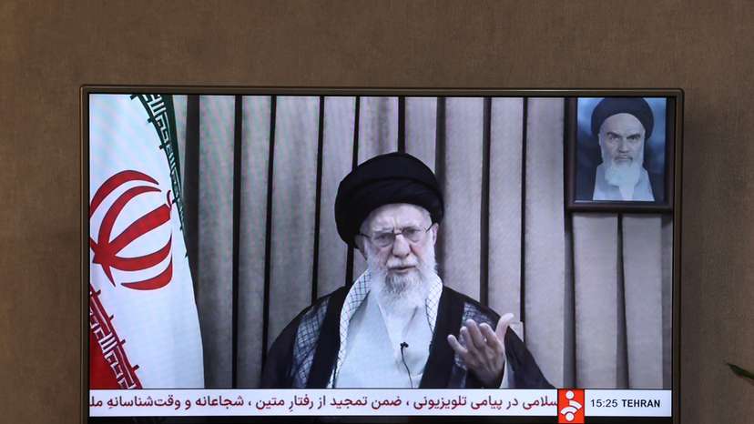 A TV screen displays the televised message of Iran's Supreme Leader, Ayatollah Ali Khamenei, during the Iran-Israel conflict in Tehran