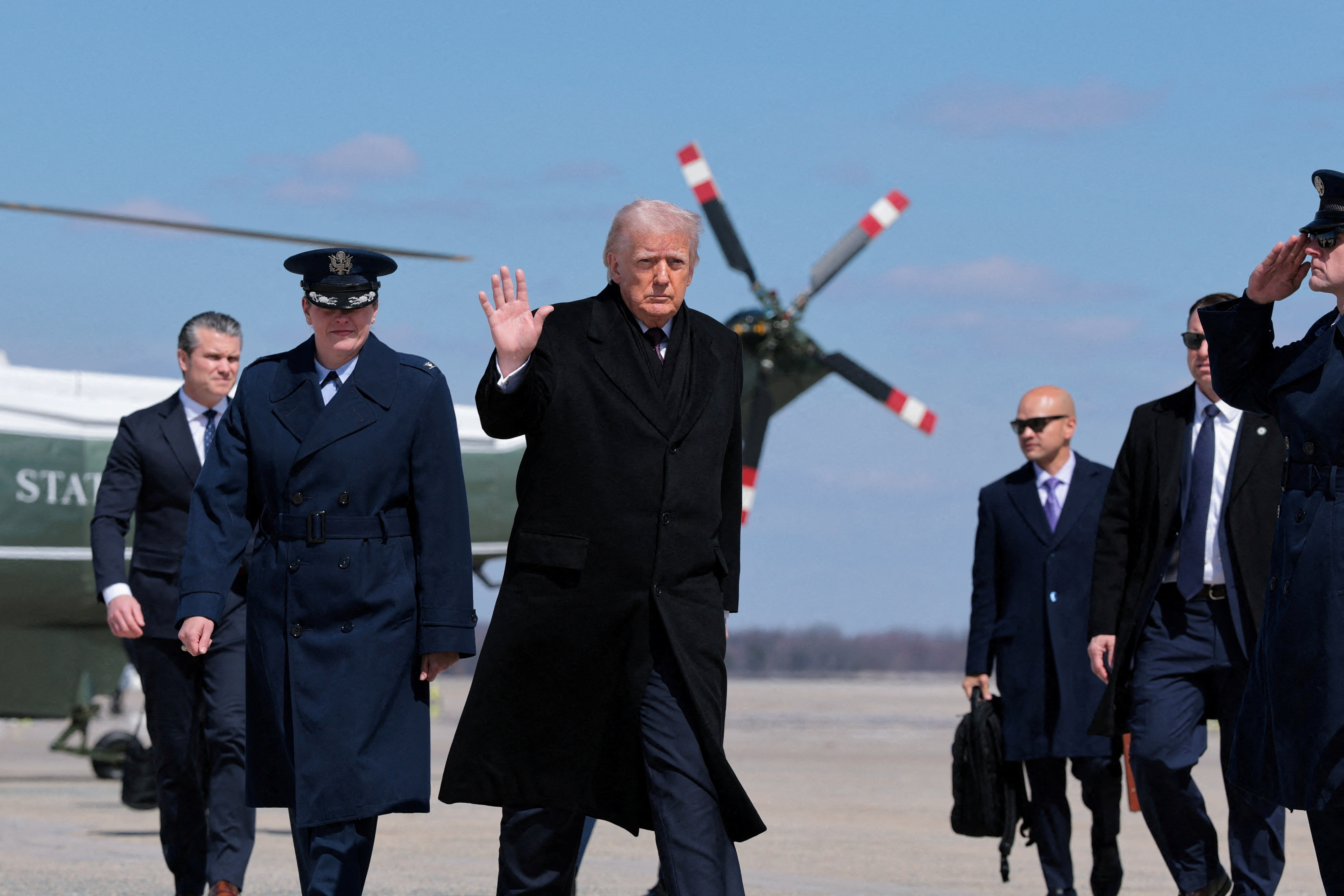 FILE PHOTO: U.S. President Donald Trump boards Air Force One at Joint Base Andrews, Maryland