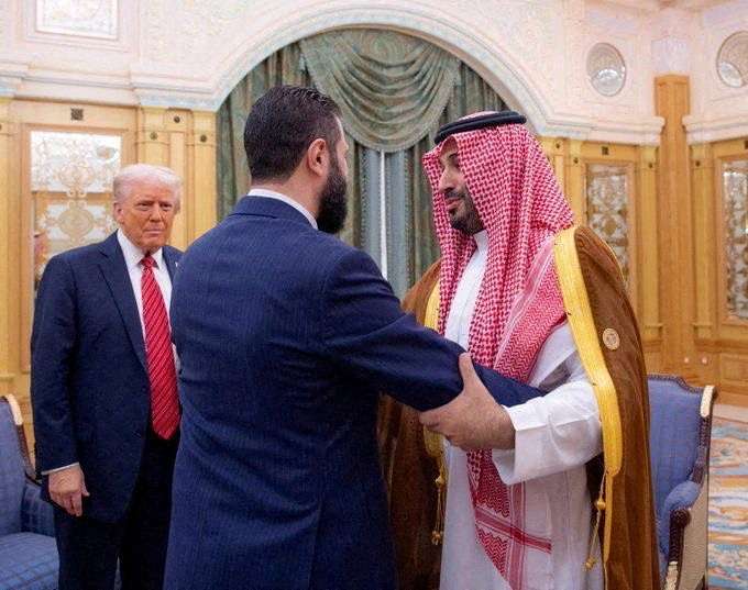 FILE PHOTO: Syrian President al-Sharaa meets with U.S. President Trump and Saudi Crown Prince Mohammed Bin Salman in Riyadh