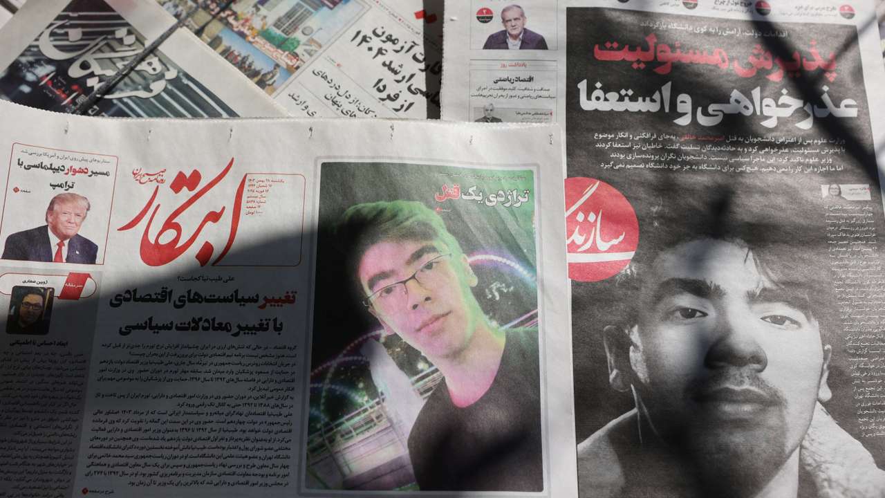 Iranian newspapers with photos of Amir Mohammad Khaleqi are seen in Tehran
