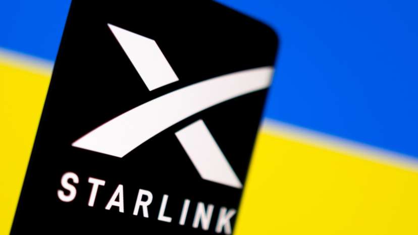 Illustration shows Starlink logo and Ukraine flag