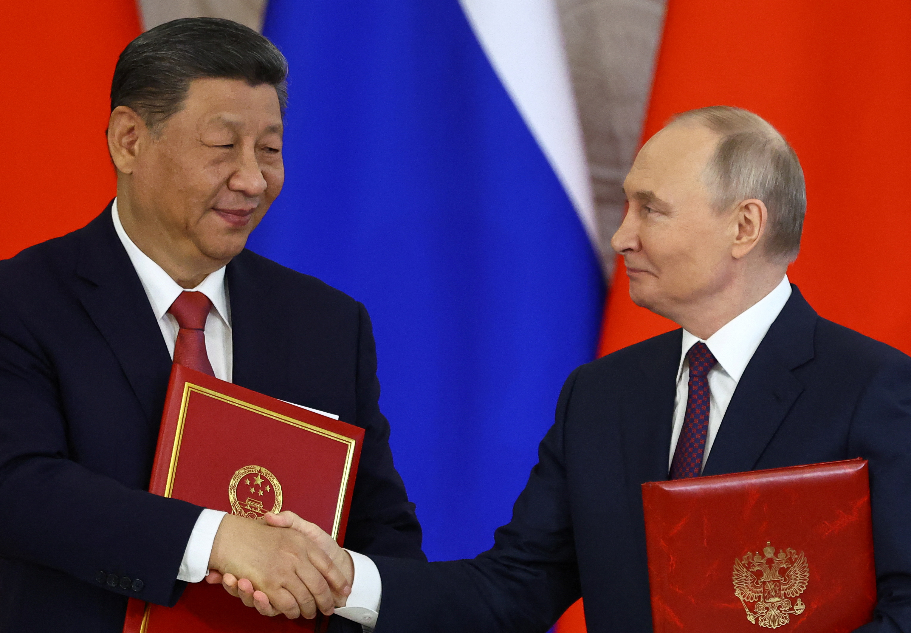 Russian President Putin and Chinese President Xi meet in Moscow