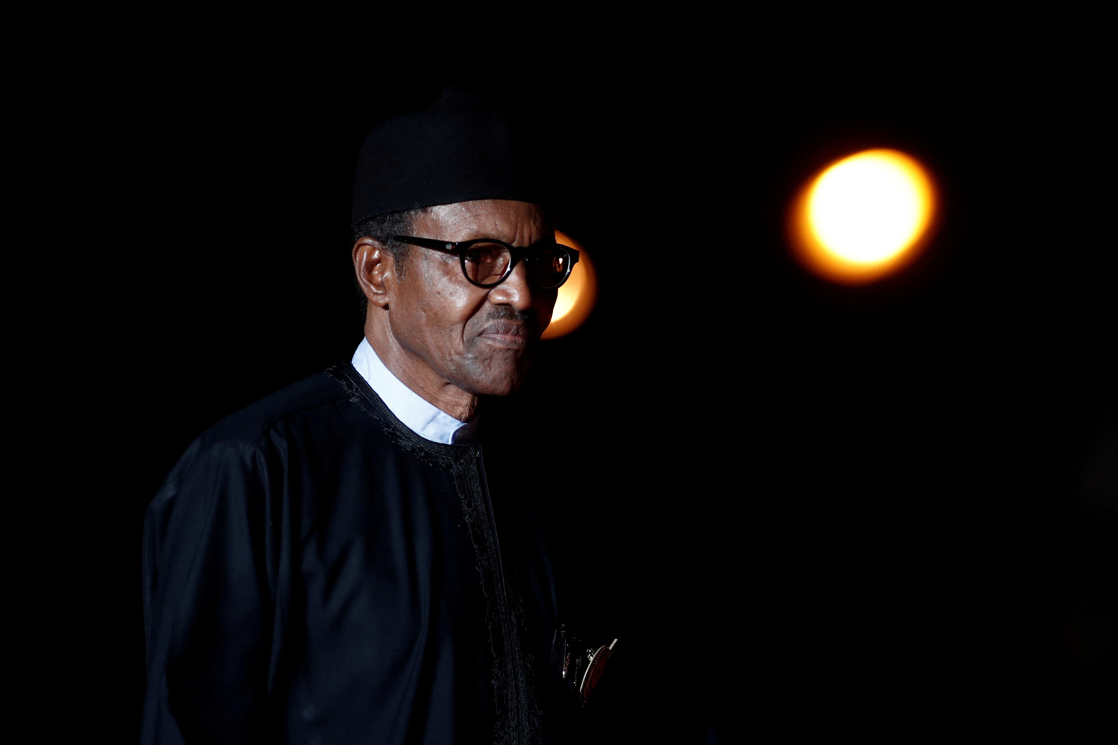 FILE PHOTO: Nigeria's President Muhammadu Buhari arrives to attend a visit and a dinner at the Orsay Museum in Paris