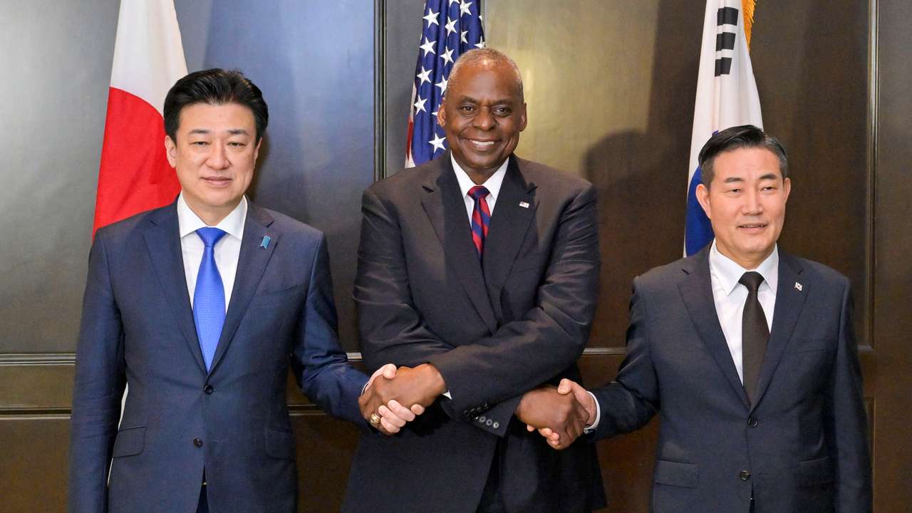 Japanese Defense Minister Minoru Kihara, U.S. Defense Secretary Lloyd Austin and South Korean Defence Minister Shin Won-sik attend a trilateral meeting on sidelines of the Shangri-la Dialogue in Singapore