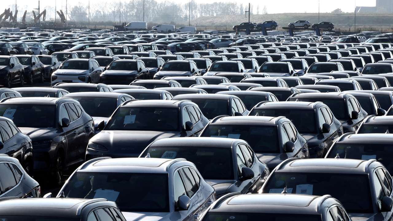 FILE PHOTO: New cars, among them new China-built electric vehicles of the company BYD, are seen parked in the port of Zeebrugge