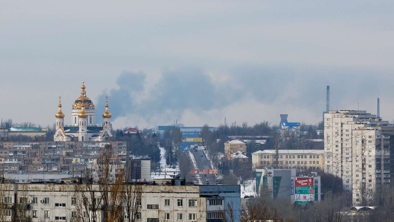 Smoke rises above the city of Donetsk