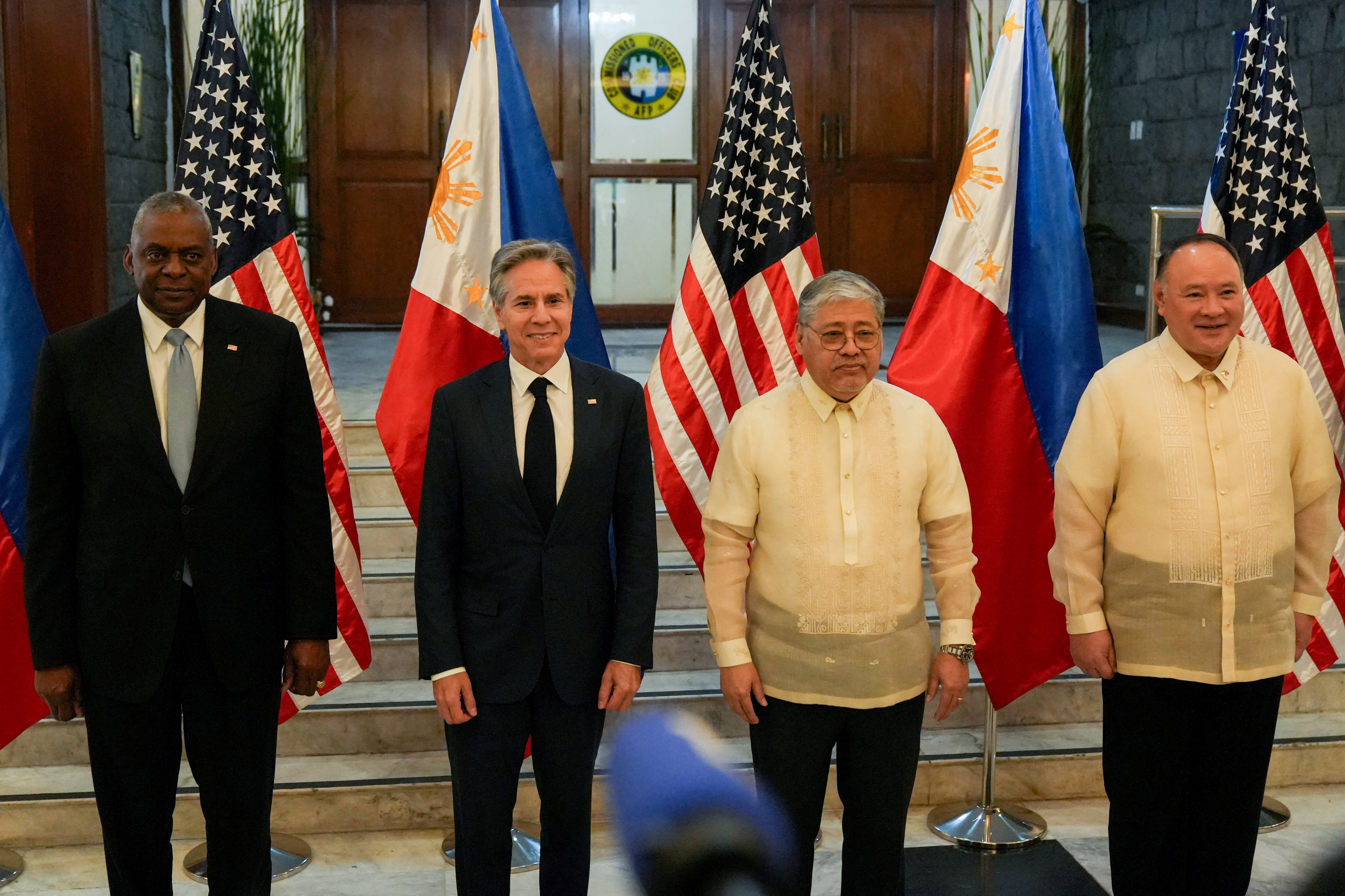 U.S. Secretary of Defense Lloyd Austin, U.S. Secretary of State Antony Blinken, Philippine Foreign Minister Enrique Manalo, and Philippine Defence Minister Gilberto Teodoro pose for a photo at Camp Aguinaldo, in Quezon City