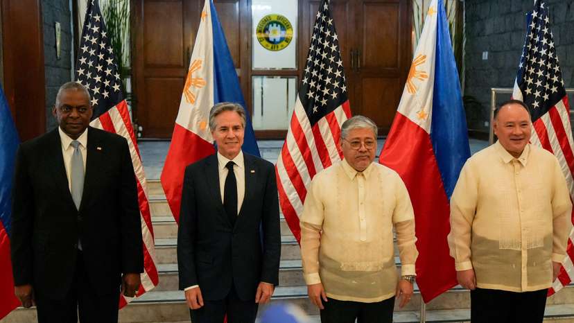 U.S. Secretary of Defense Lloyd Austin, U.S. Secretary of State Antony Blinken, Philippine Foreign Minister Enrique Manalo, and Philippine Defence Minister Gilberto Teodoro pose for a photo at Camp Aguinaldo, in Quezon City