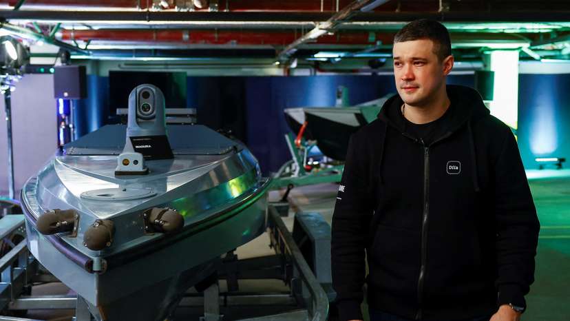 Minister of Digital Transformation of Ukraine Fedorov walks next to Magura unmanned marine vehicles during an interview with Reuters in Kyiv
