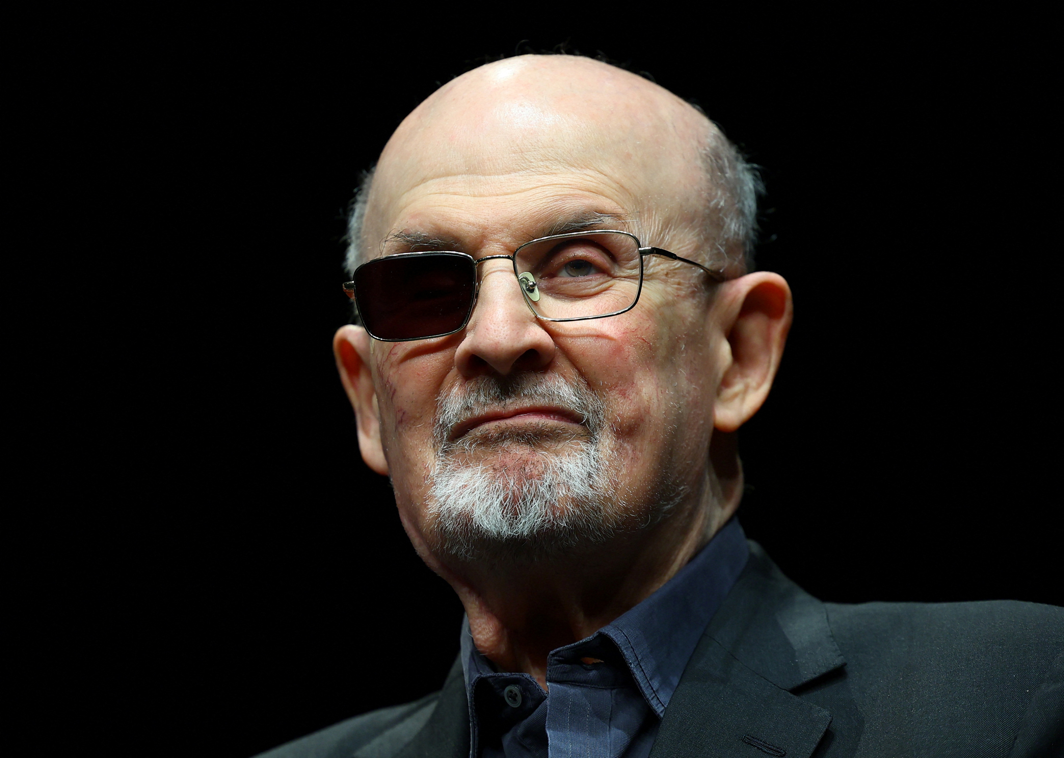 Author Salman Rushdie attends a photocall in Berlin