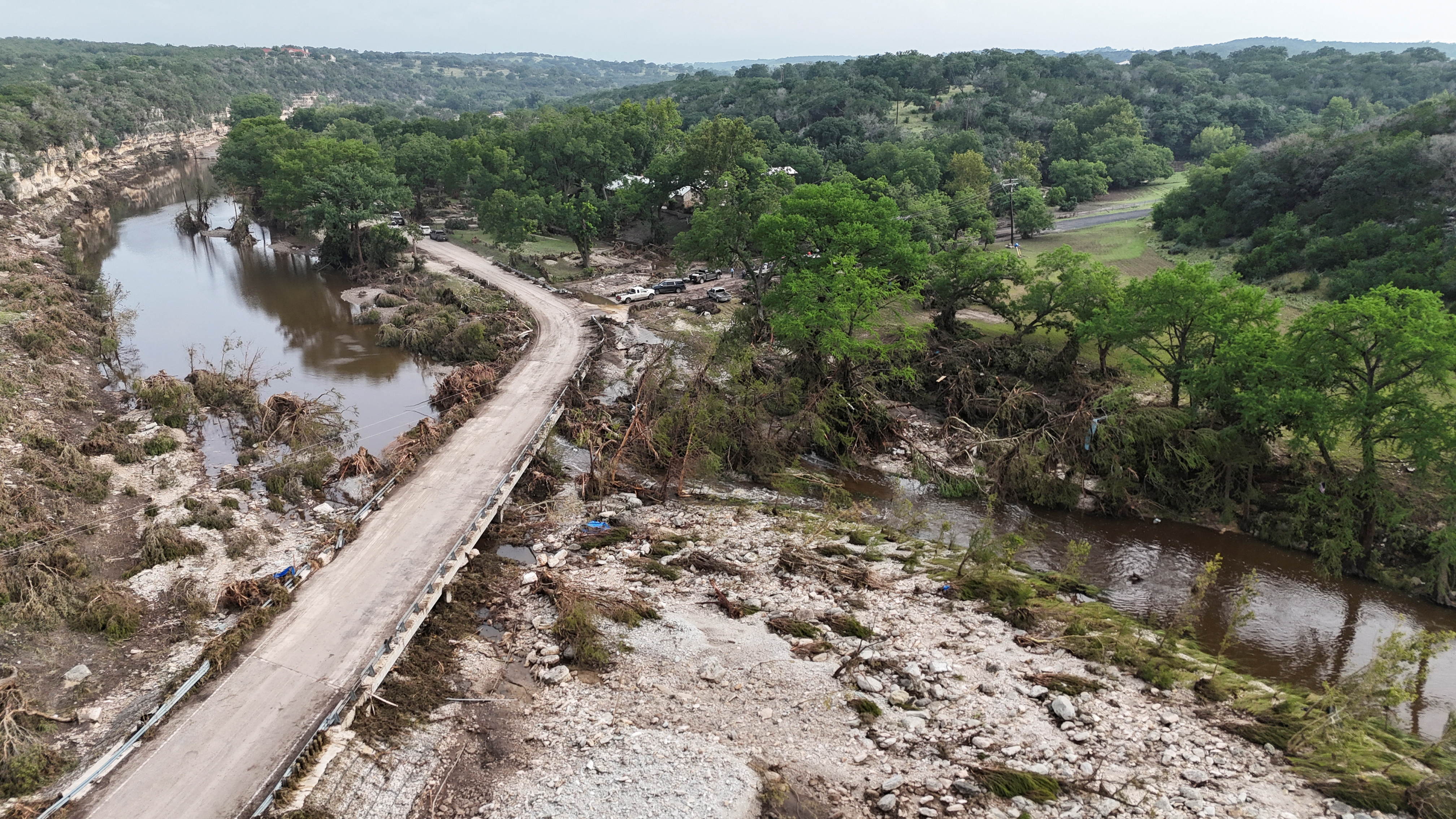 A drone view shows the Guadalupe River and damage from flooding near Camp Mystic