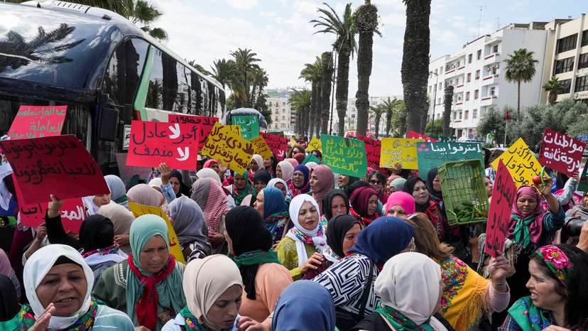 Tunisian women agricultural workers gather during a protest as they demand social protection and recogniction of their profession in Tunis