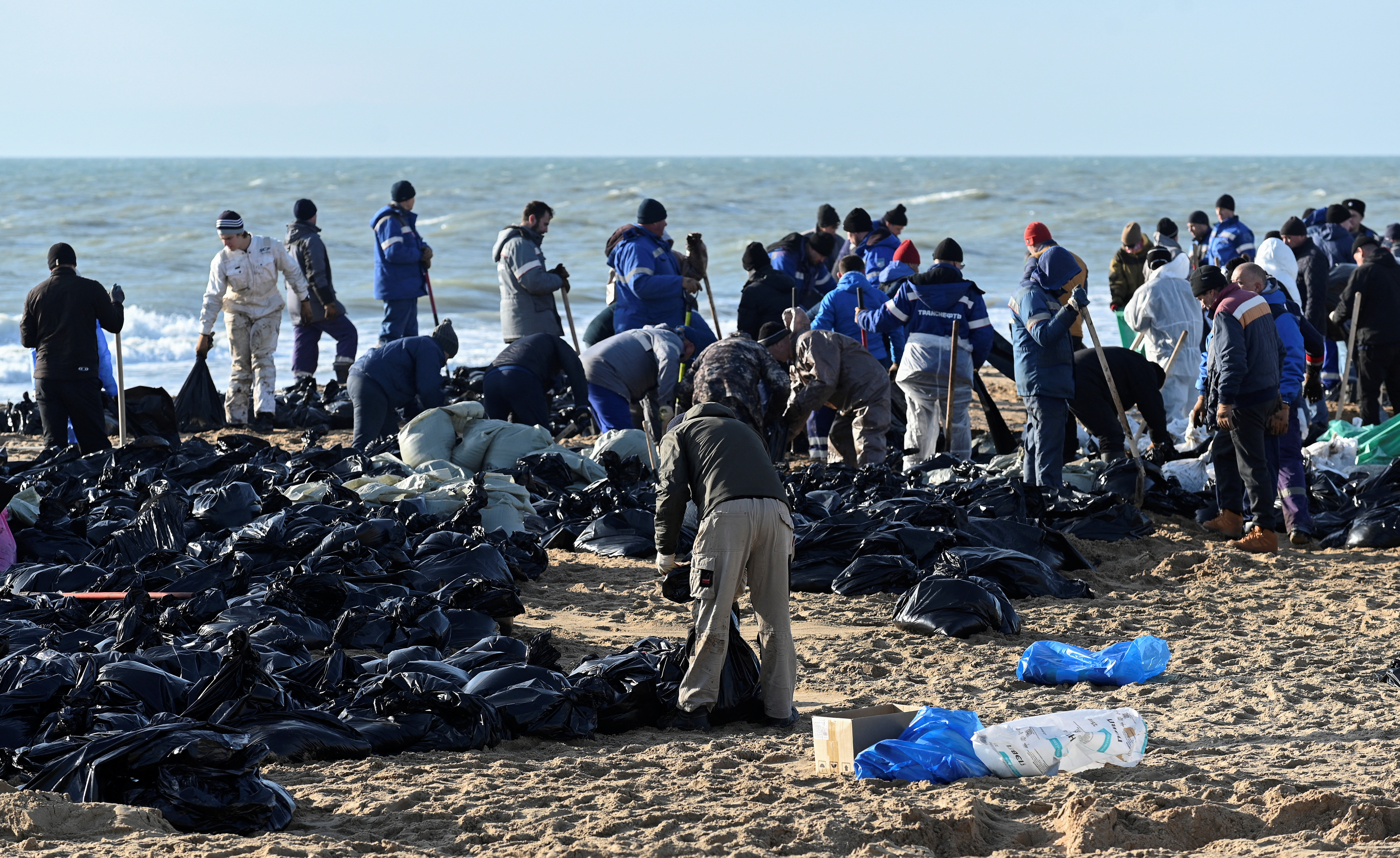 Volunteers battle to clear spilled oil on Russia's Black Sea coast