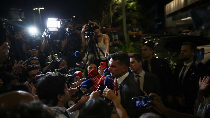 Brazil's Bolsonaro taken to hospital after feeling sick, son says