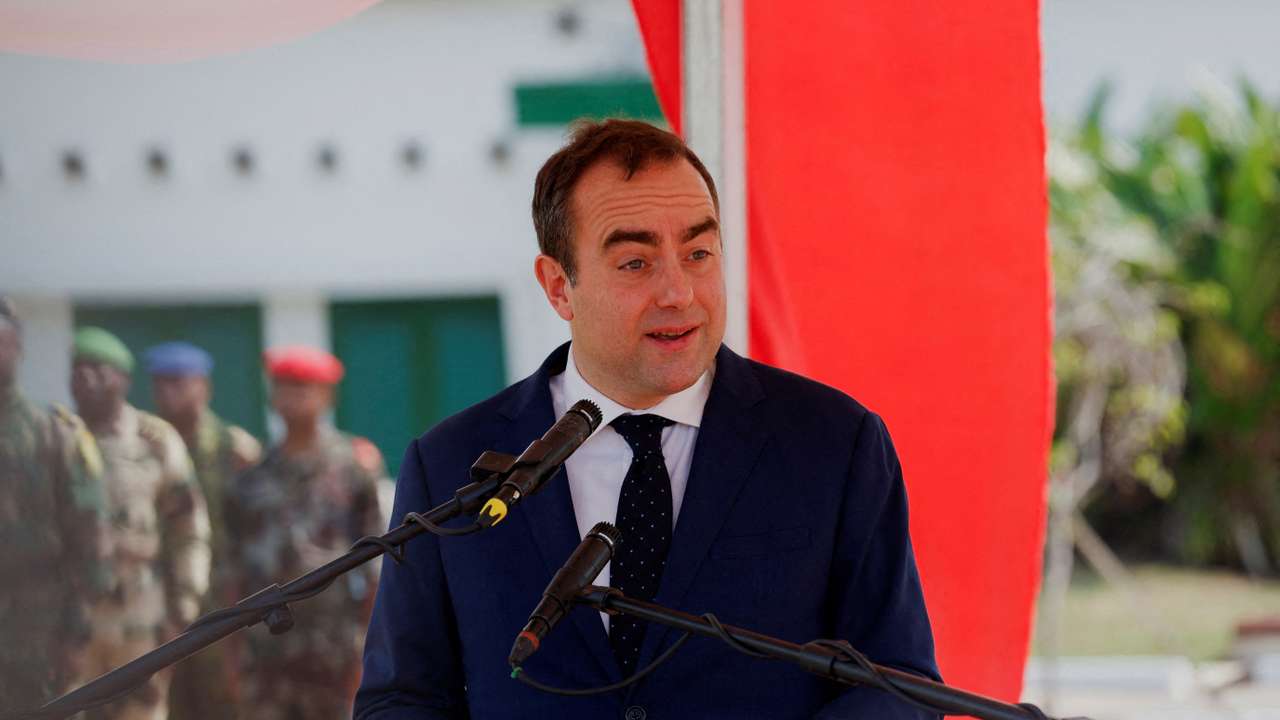 French Defense Minister Sebastien Lecornu speaks during the ceremony marking the departure of French troops from Ivory Coast