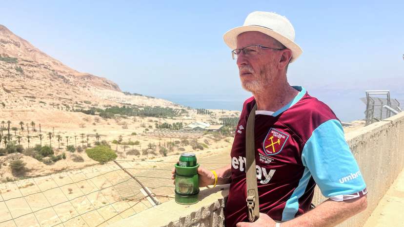 Thomas Hand, the Irish-born father of 9-year-old Emily Hand who was taken hostage by Hamas on October 7 and was returned in a hostages-prisoners swap deal, looks out towards the desert from his temporary accommodation in Ein Gedi