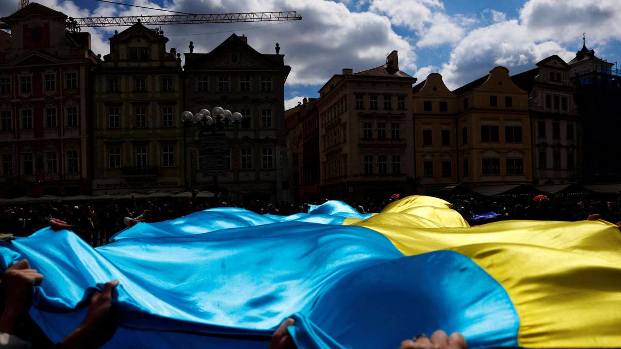 FILE PHOTO: People attend a rally over Ukraine conflict in Prague