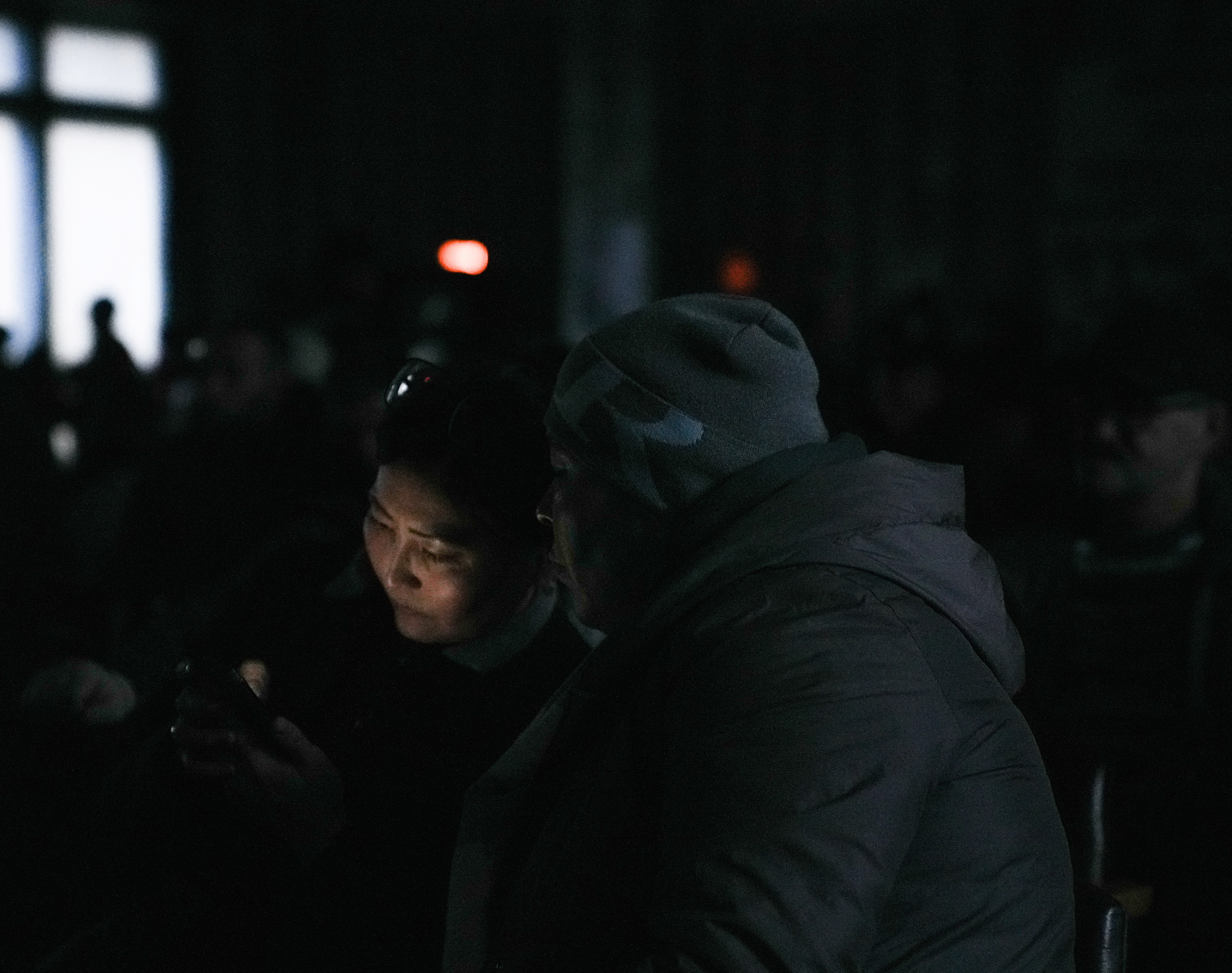 Relatives of miners gather at the Kostenko coal mine in Karaganda