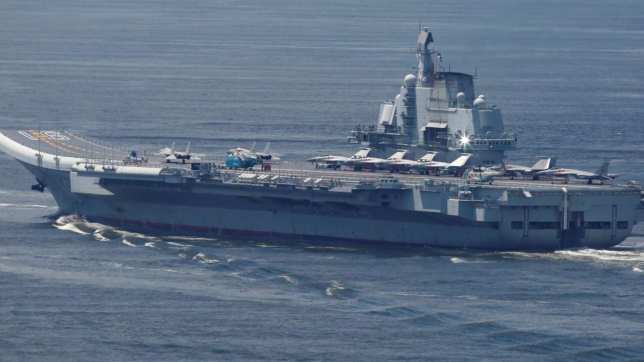 China's aircraft carrier Liaoning departs Hong Kong