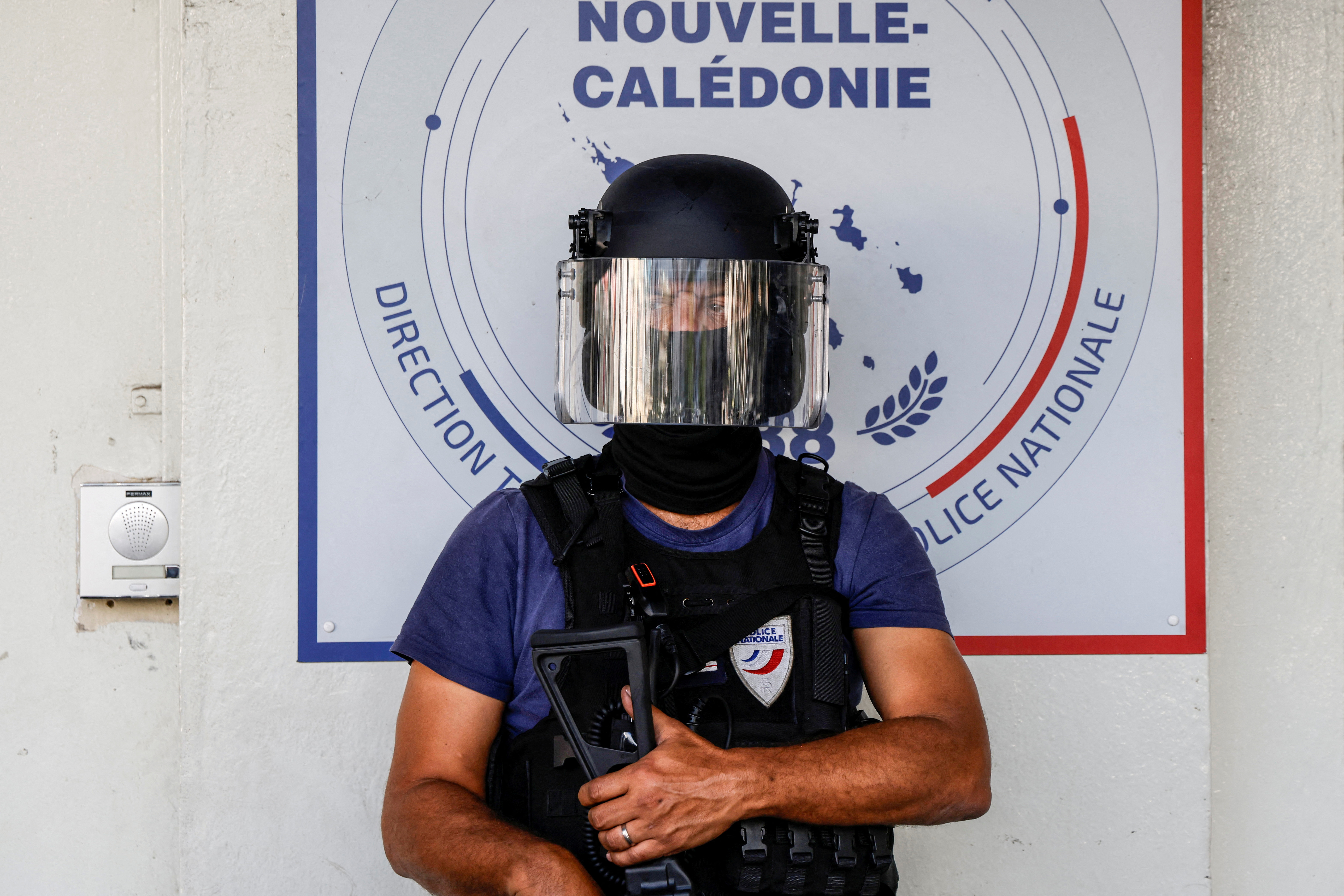 FILE PHOTO: A policeman in New Caledonia