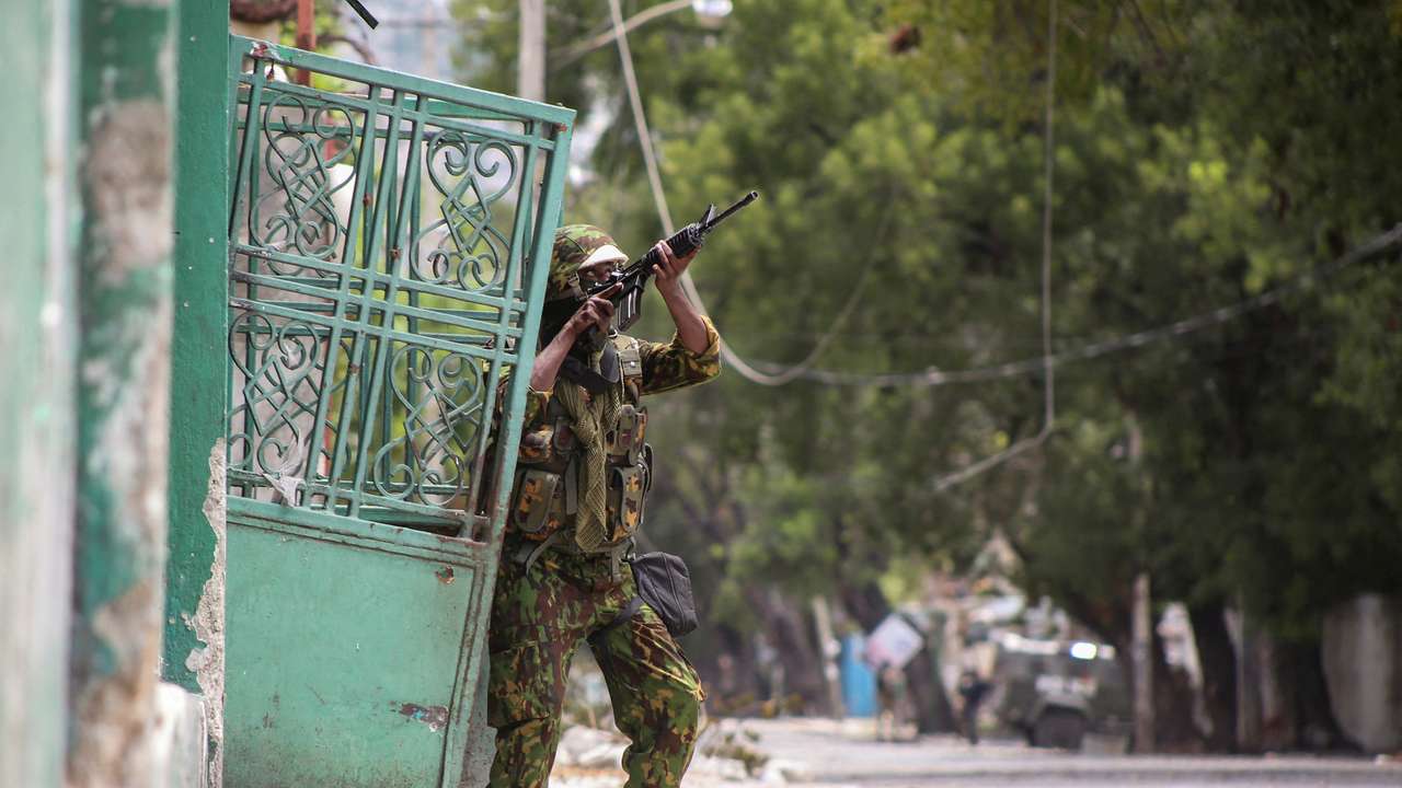 FILE PHOTO: Kenyan and Haitian police patrol in Port-au-Prince