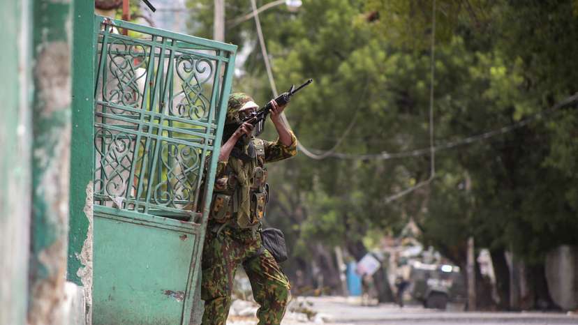 FILE PHOTO: Kenyan and Haitian police patrol in Port-au-Prince