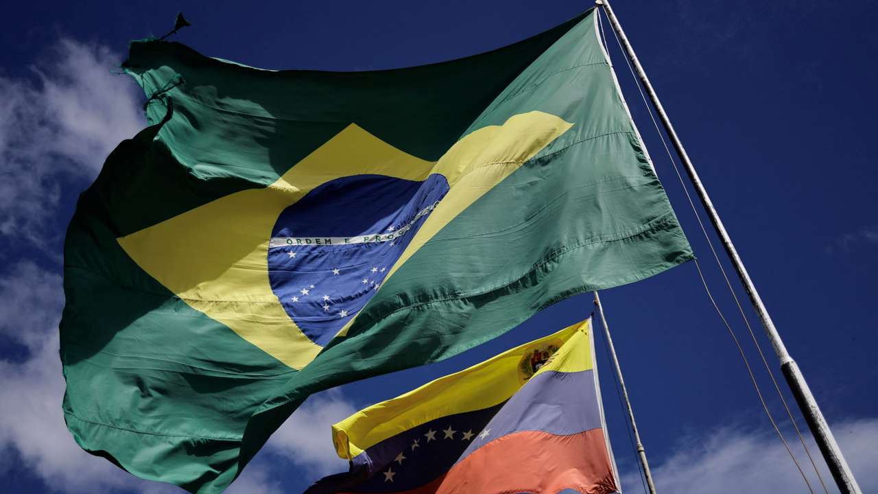 National flags of Brazil and Venezuela flutter at the Brazil-Venezuela border in the Brazilian city of Pacaraima