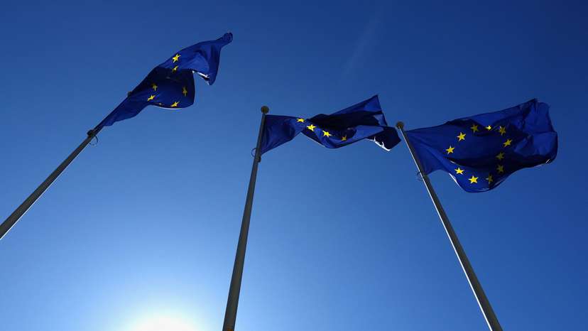 European Union flags flutter outside the EU Commission headquarters in Brussels