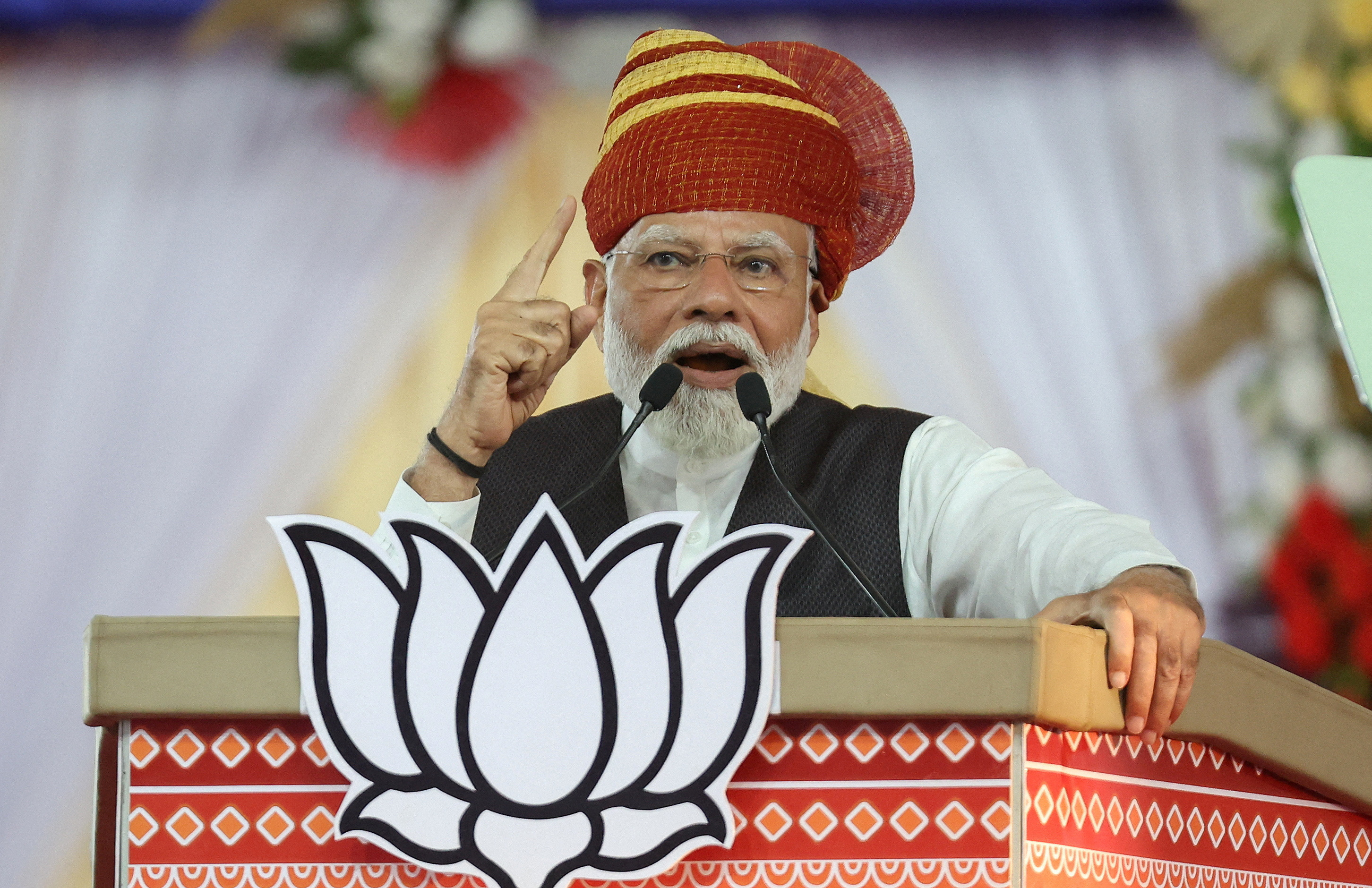 FILE PHOTO: India's Prime Minister Narendra Modi during an election campaign rally in Himmatnagar
