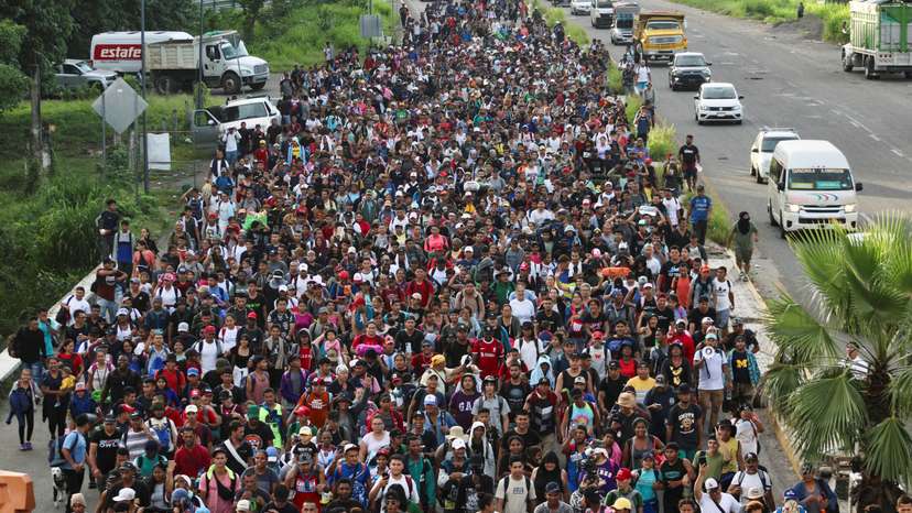 Migrants walk in a caravan toward U.S., in Tapachula