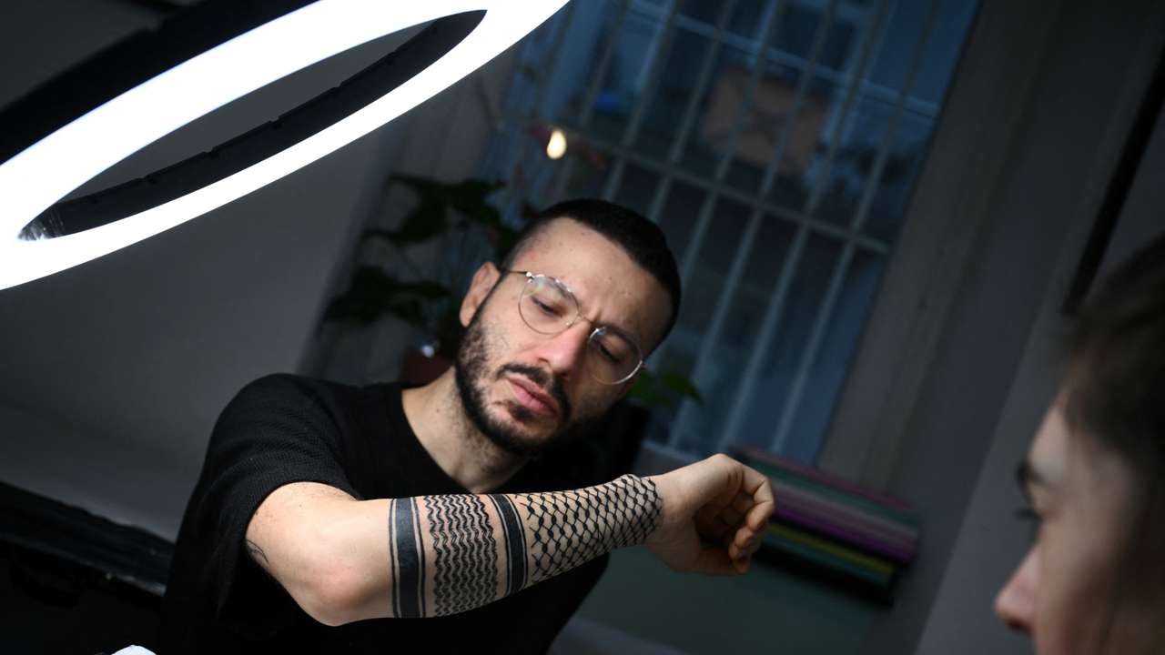 From a headdress to a tattoo, Keffiyeh rises as Palestinian solidarity symbol