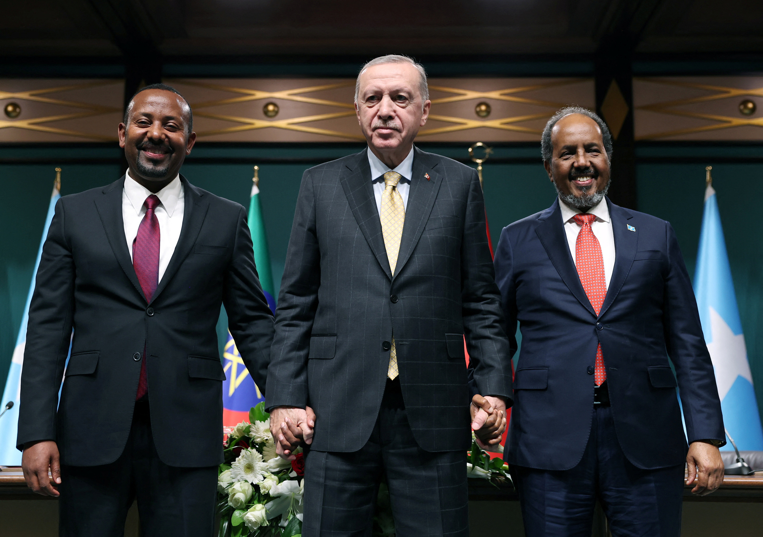 Turkish President Erdogan poss with Somali President Hassan Sheikh Mohamud and Ethiopian Prime Minister Abiy Ahmed in Ankara