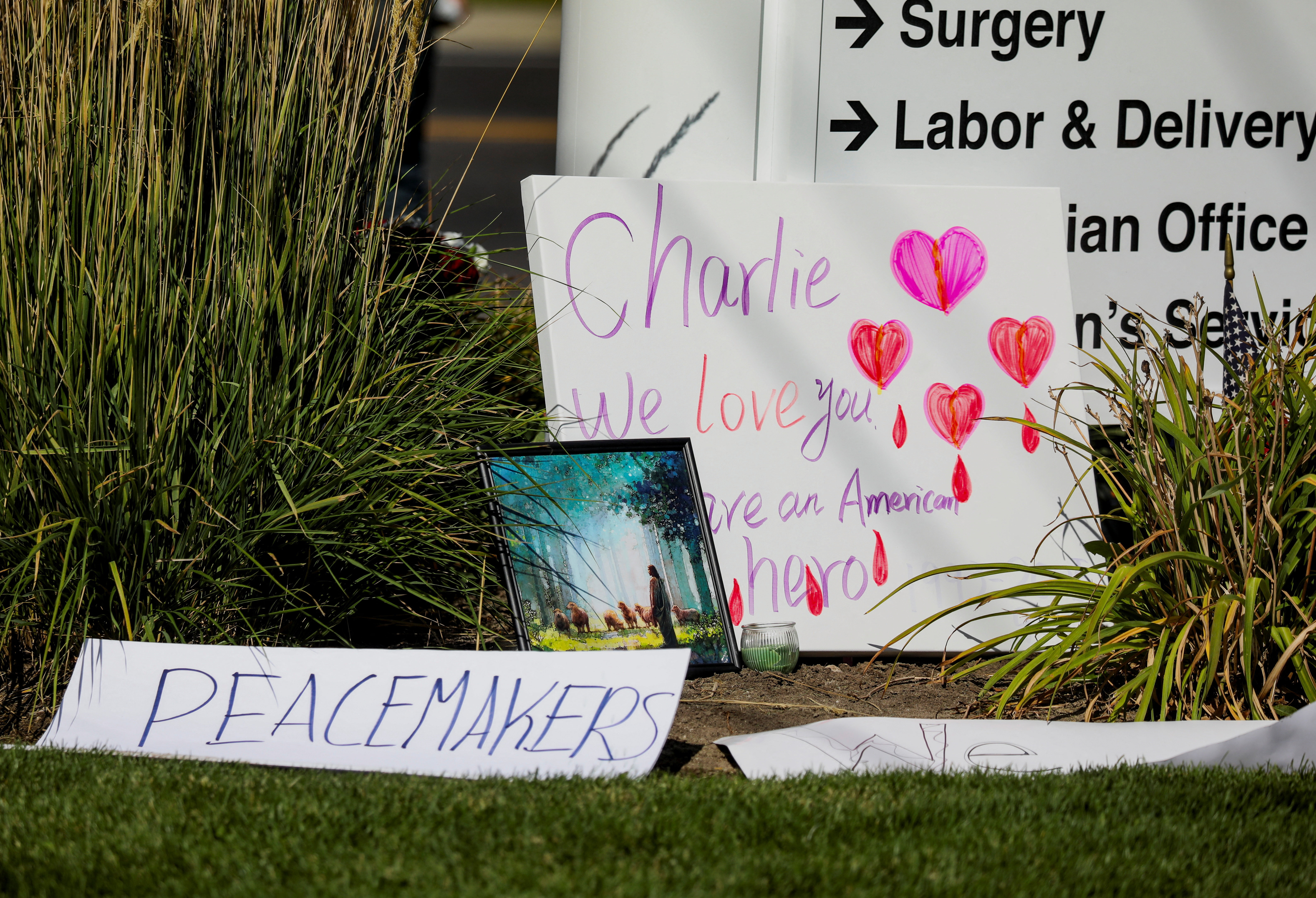 People mourn U.S. right-wing activist Kirk at a memorial at Orem's Timpanogos Regional Hospital
